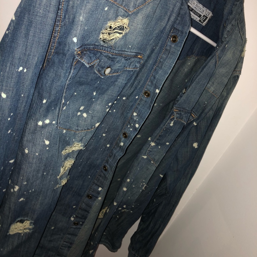 Over sized distressed denim shirt